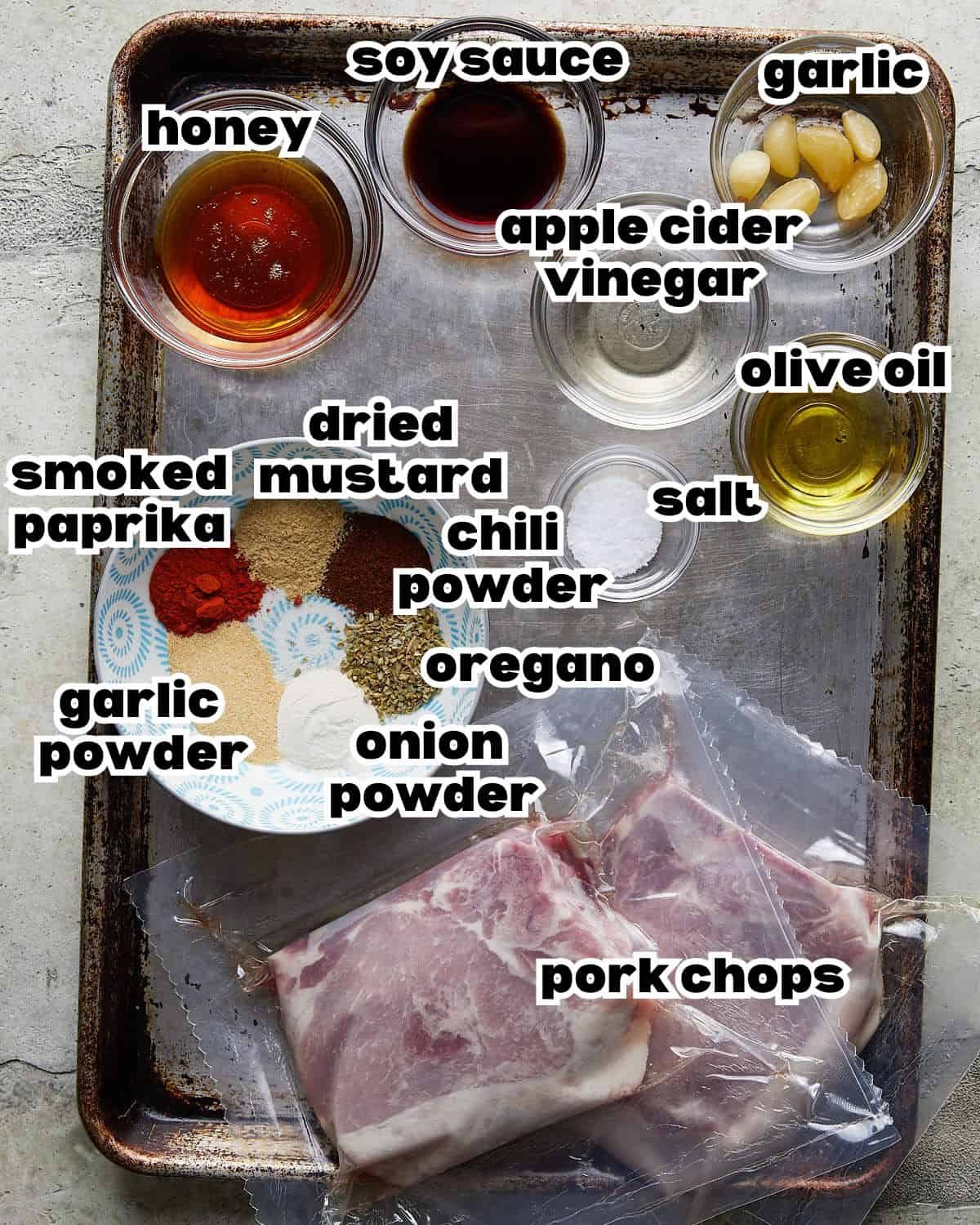 Overhead image of ingredients needed to make honey glazed pork chops.