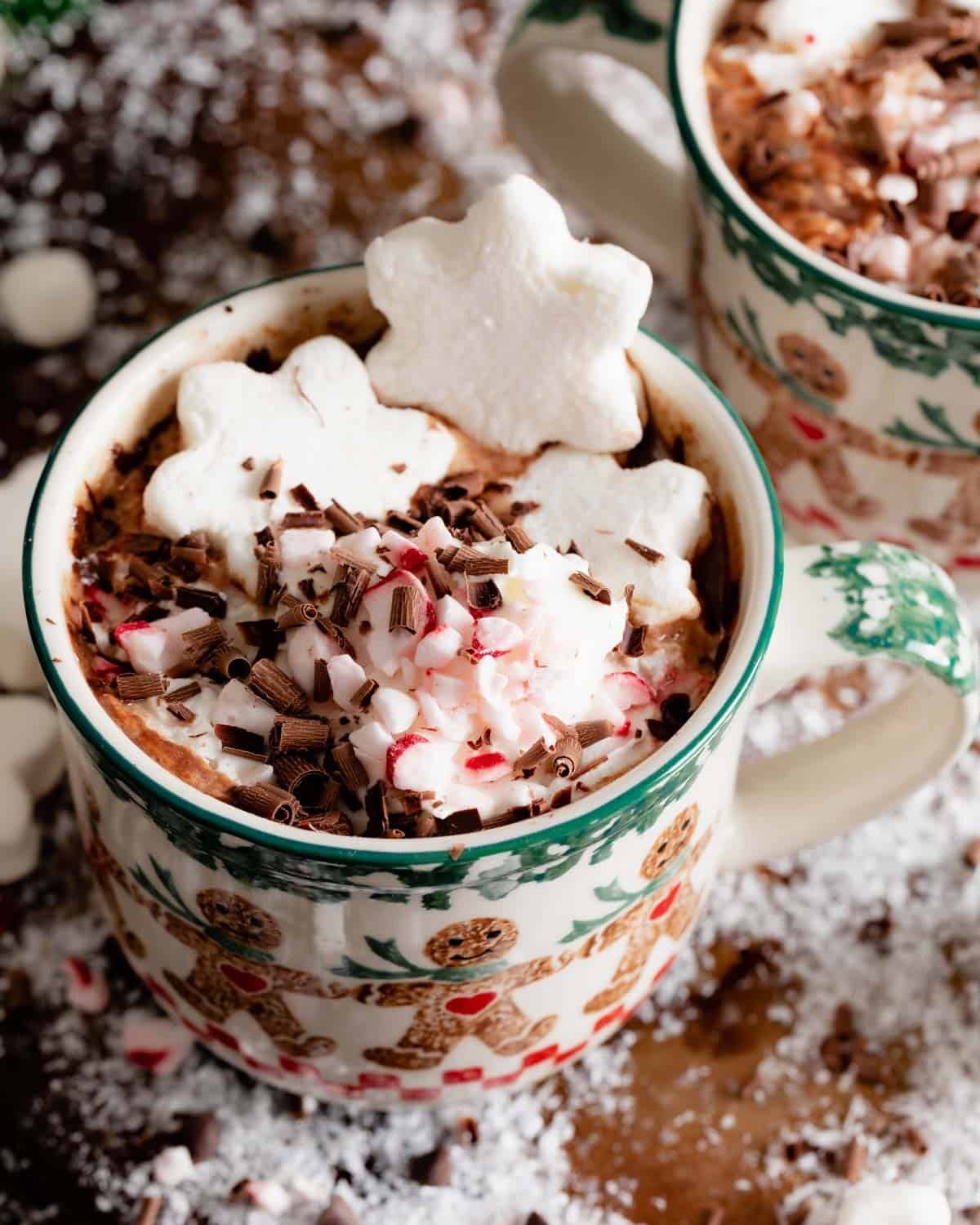 closeup of instant pot hot chocolate in mug with whipped cream on top