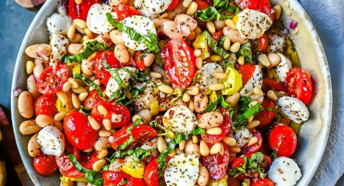 Overhead image of Italian cowboy caviar recipe in white bowl.