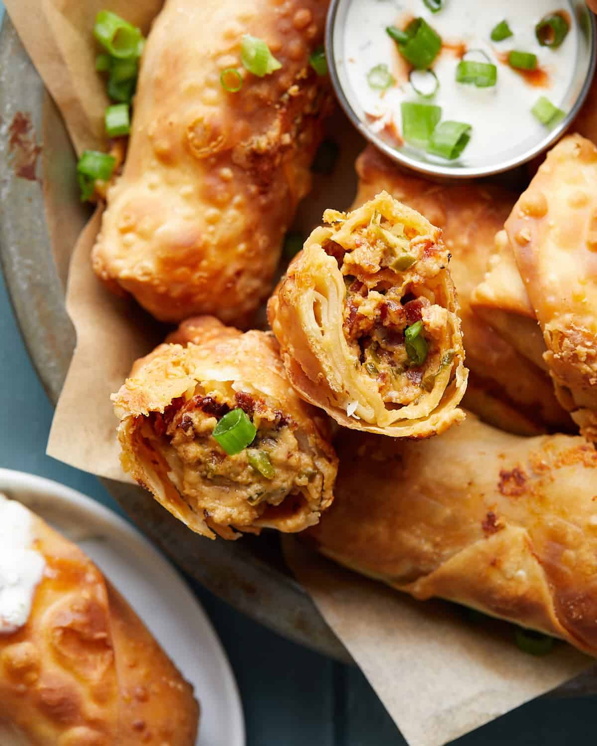 Up close image of open jalapeno popper egg roll.