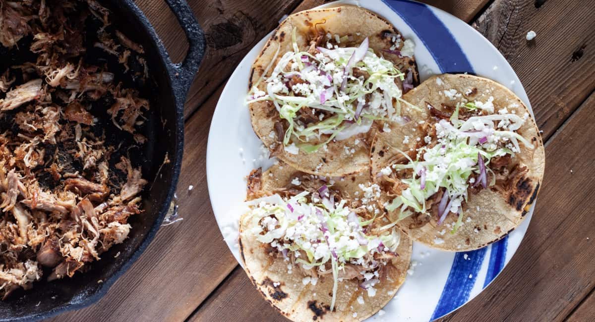 Overhead image of leftover pulled pork tacos.