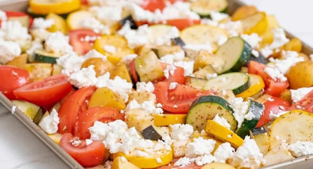 Overhead image of oven roasted vegetables with feta.
