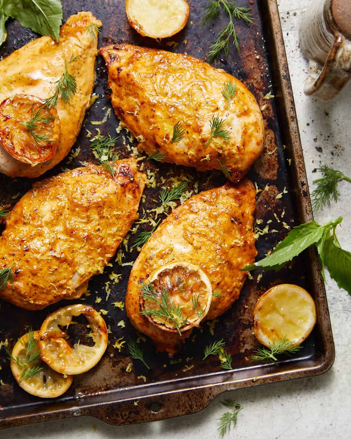 Lemon chicken marinade with garnish.