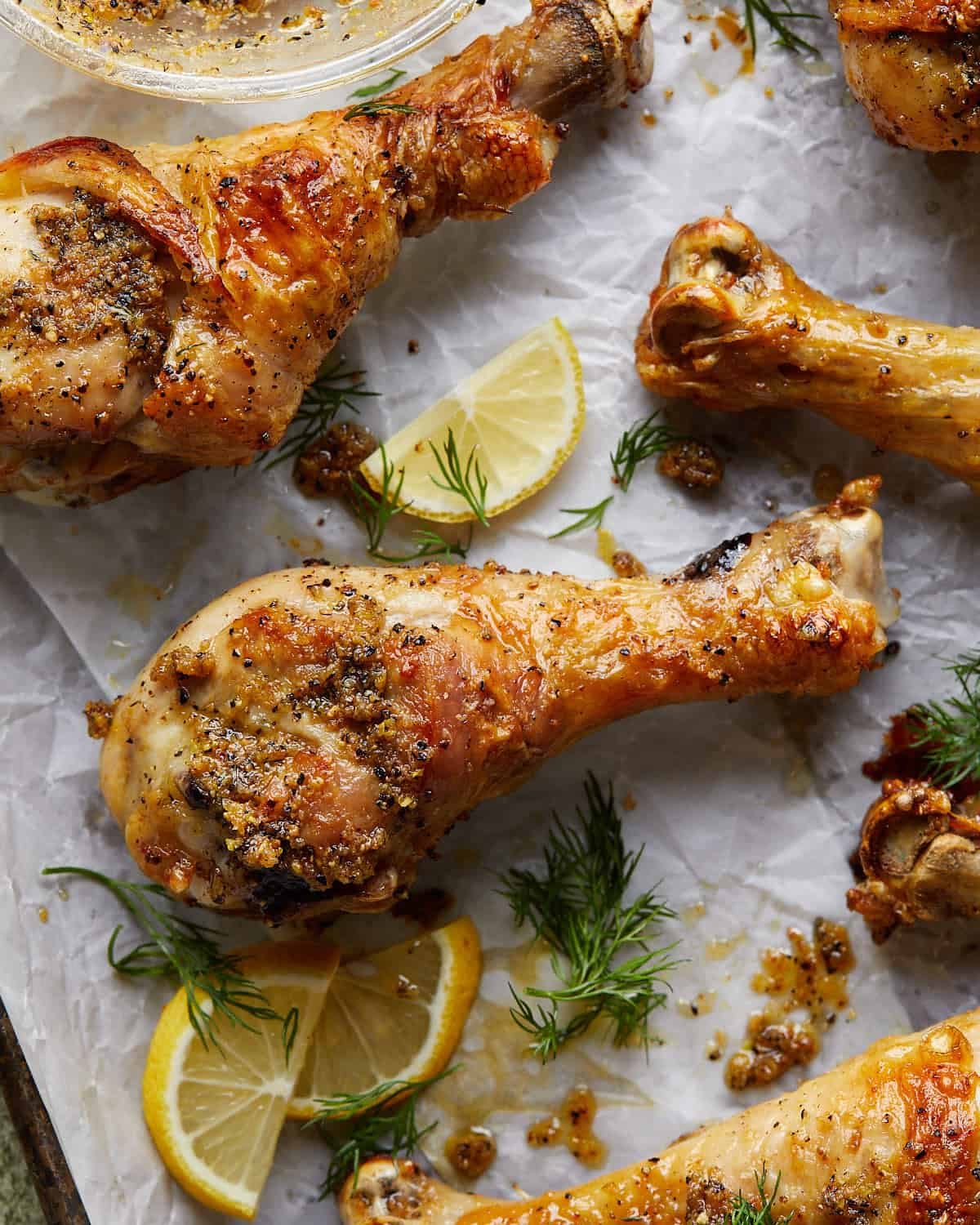 Up close image of lemon pepper chicken drumsticks.
