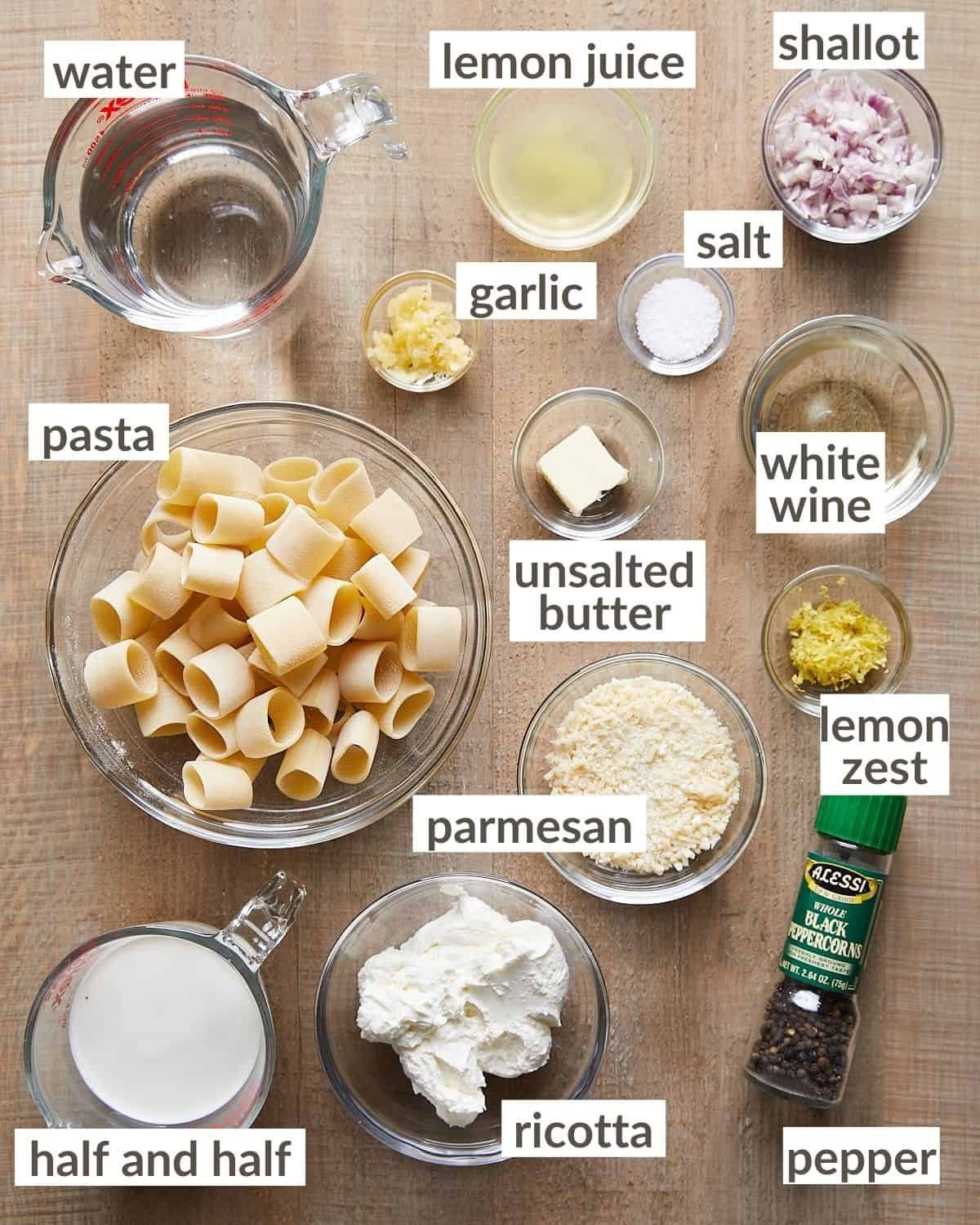 Ingredients needed to make lemon ricotta in glass bowls.