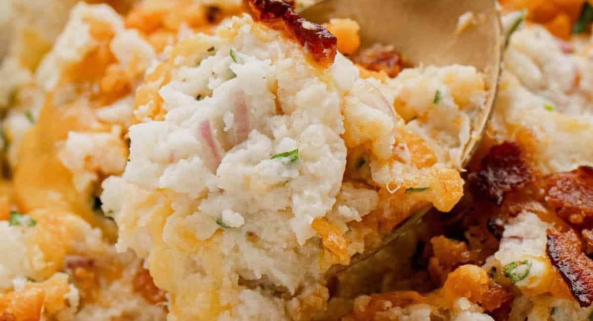 Up close image of loaded mashed potato bake.