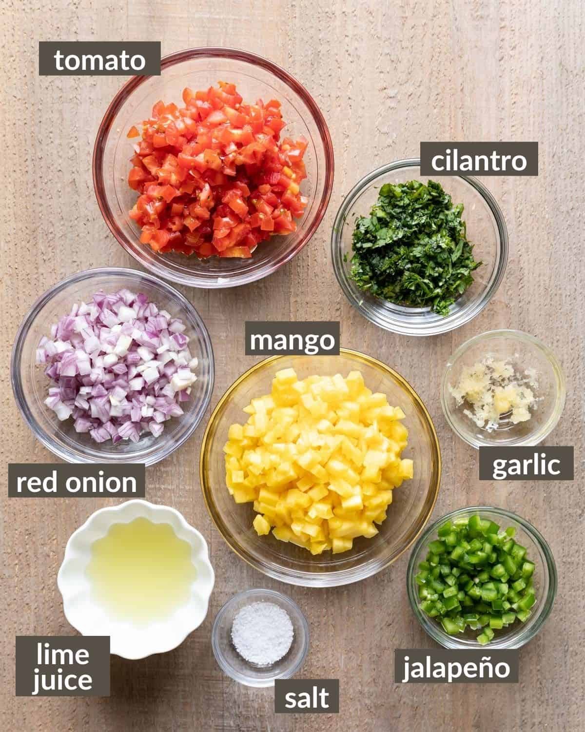 overhead shot of ingredients for mango pico de gallo
