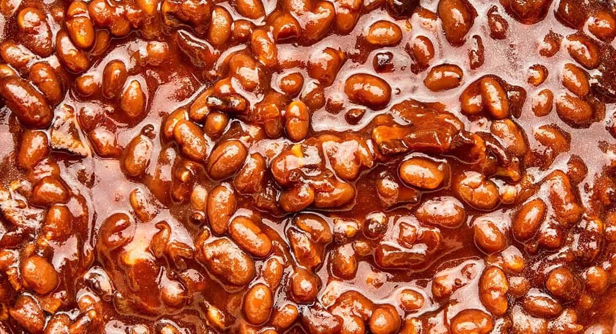 Up close image of molasses baked beans.