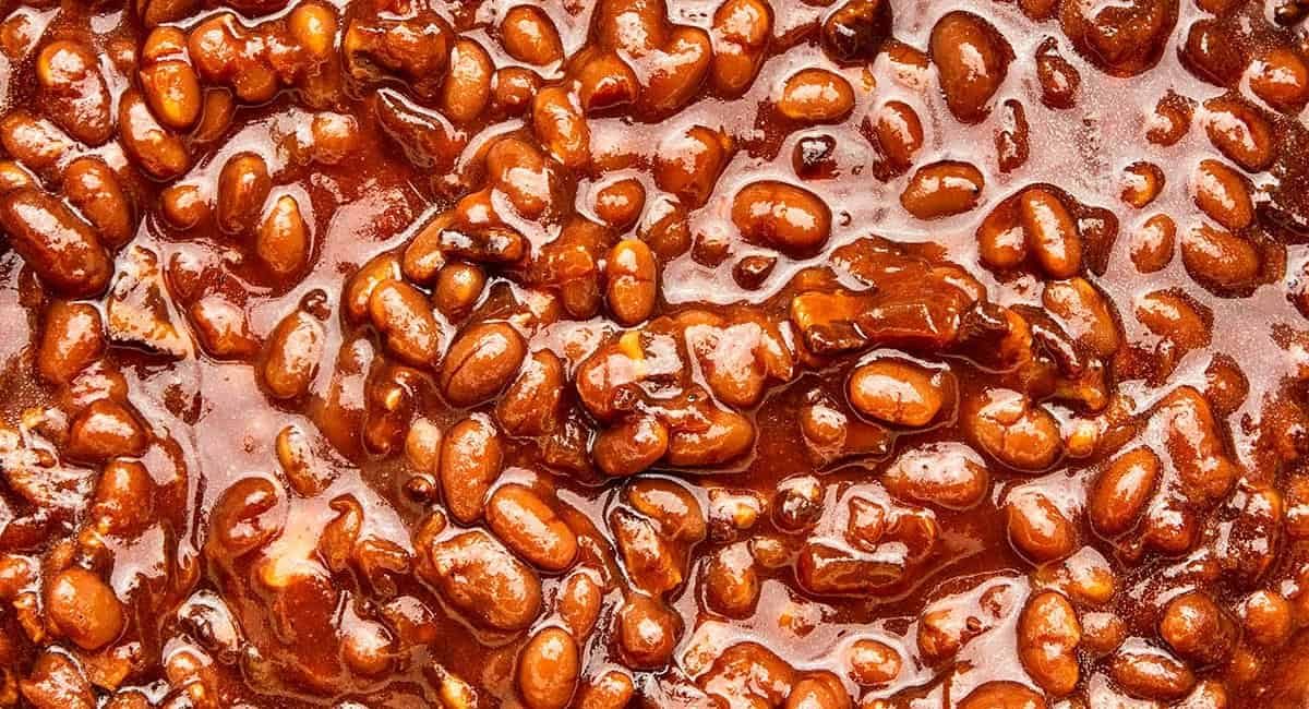 Up close image of molasses baked beans.