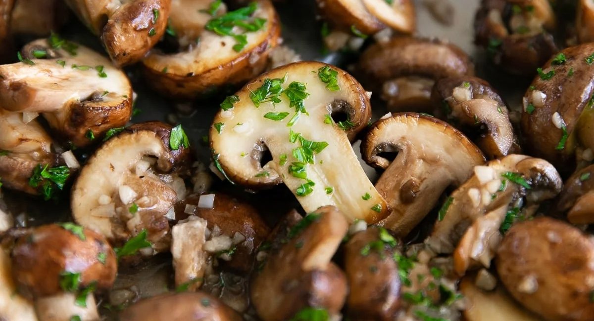 Up close image of sautéed mushrooms.