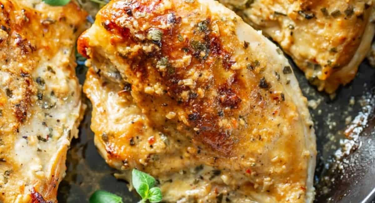 Up close image of oven roasted greek chicken breasts.