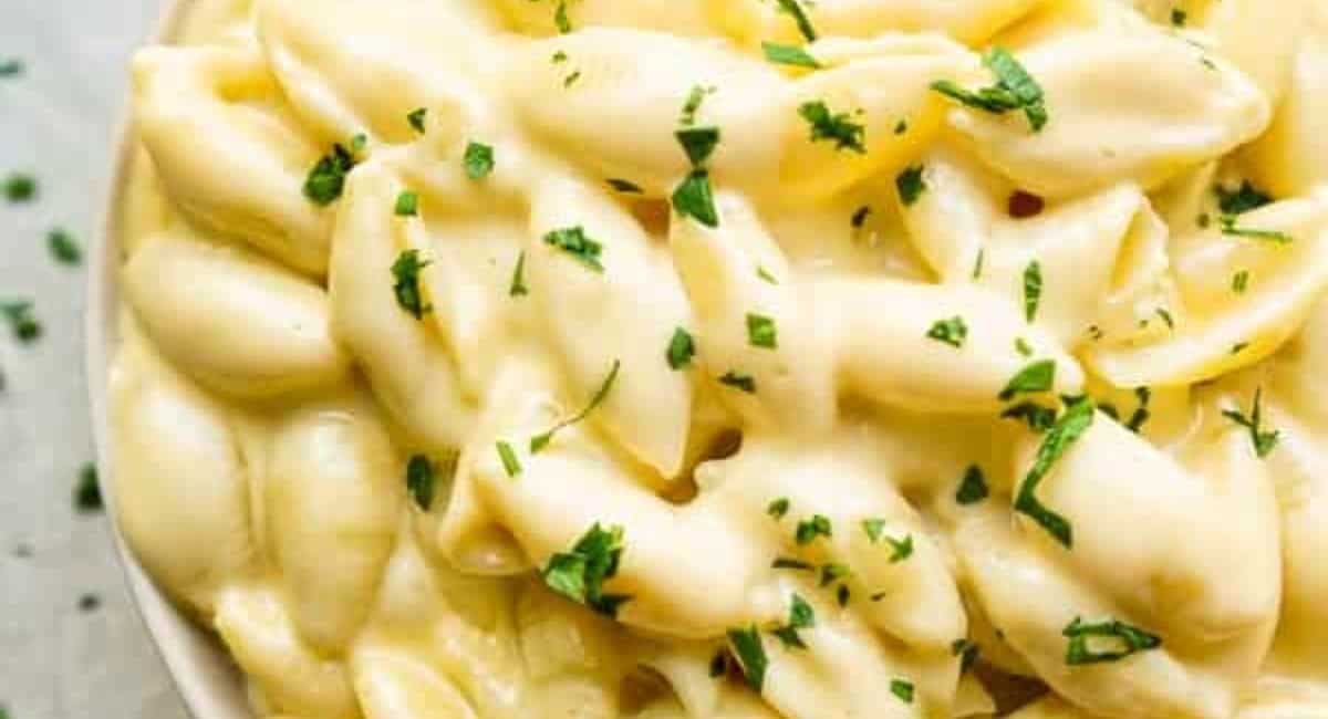 Up close image of macaroni and cheese with garnish.