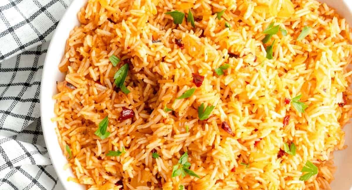 Overhead image of adobo fried rice with garnish.