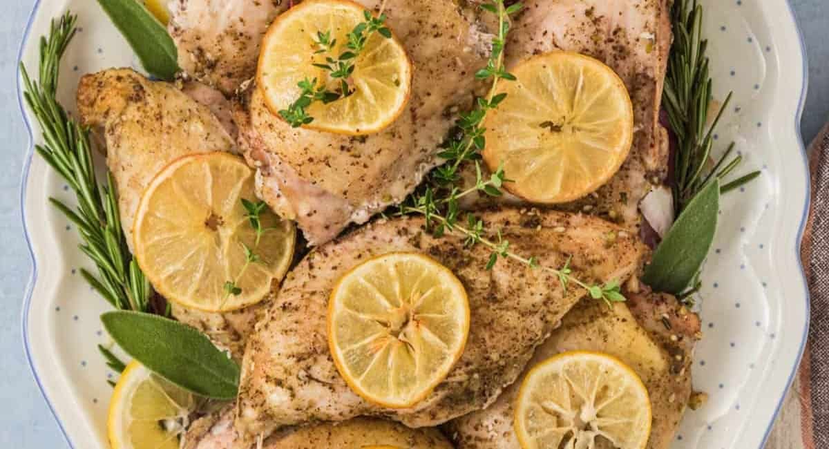 Overhead image of za'atar roasted chicken with lemon and herbs.