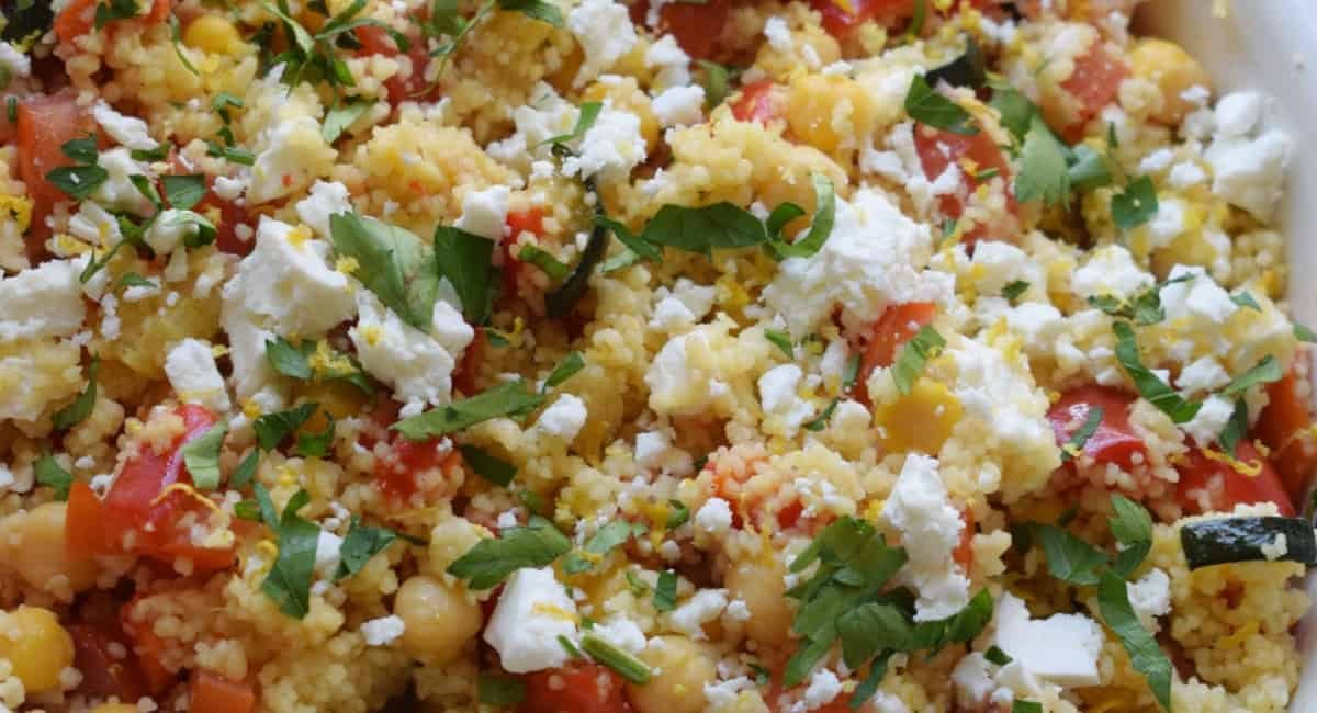 Up close image of couscous salad in a lemon vinaigrette.