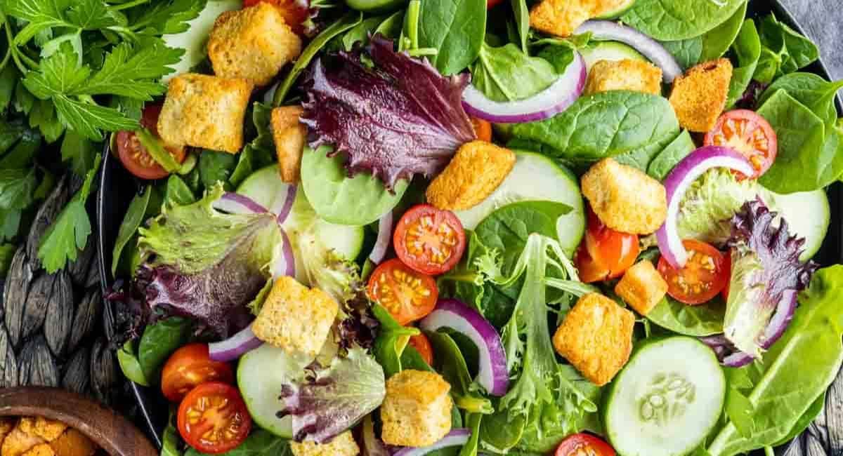 Overhead image of mixed green salad.