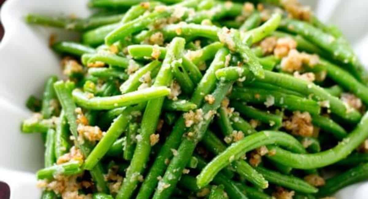 Up close image of Italian green beans with garnish.