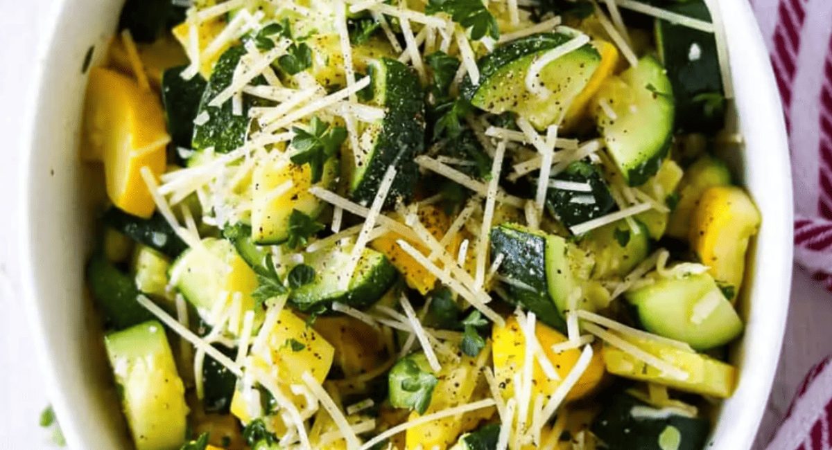 Up close image of sauteed yellow squash zucchini.