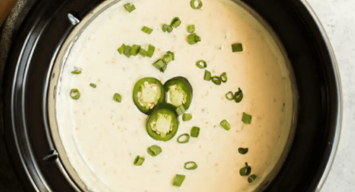 Overhead image of slow cooker queso verde.