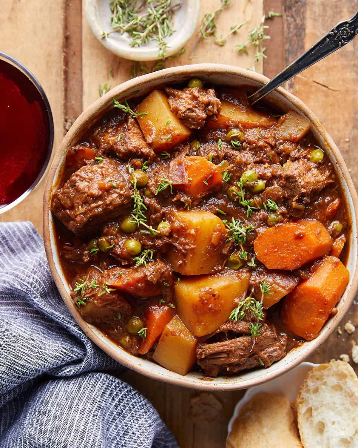 Overhead image of old fashioned beef stew with garnish.