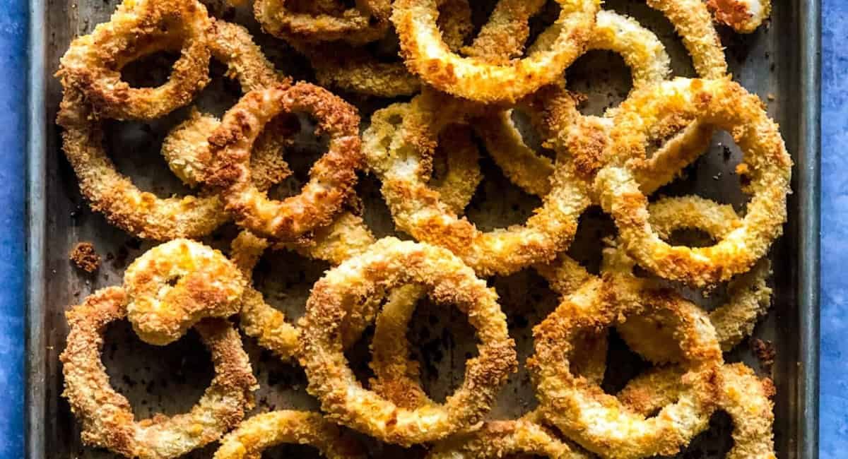 Overhead image of oven baked onion rings.