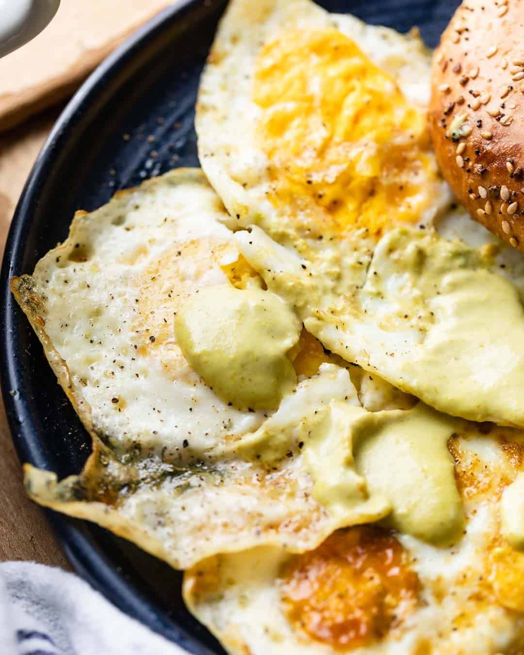 Over hard eggs with hot sauce.
