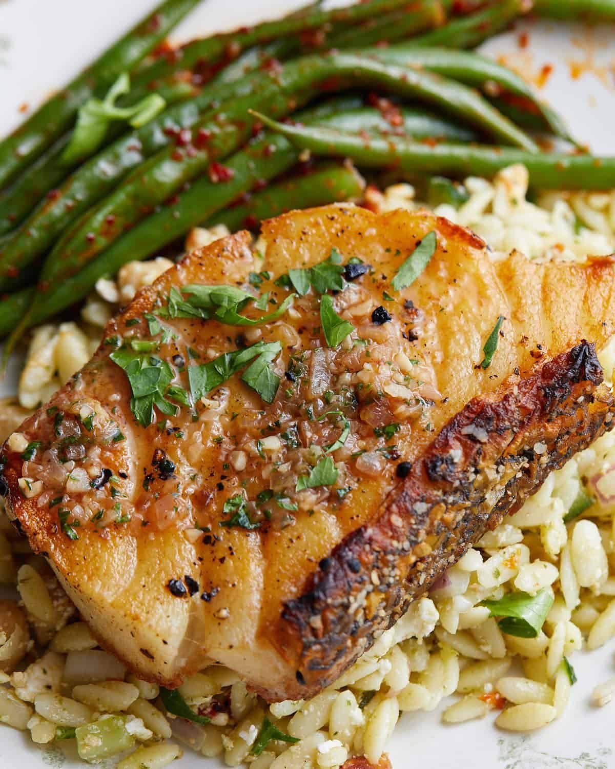 Up close image of pan seared chilean sea bass.