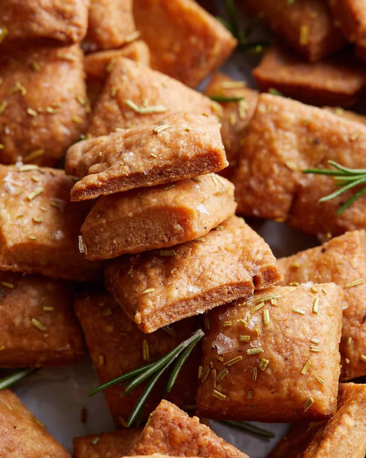 Up close image of homemade parmesan rosemary crackers.