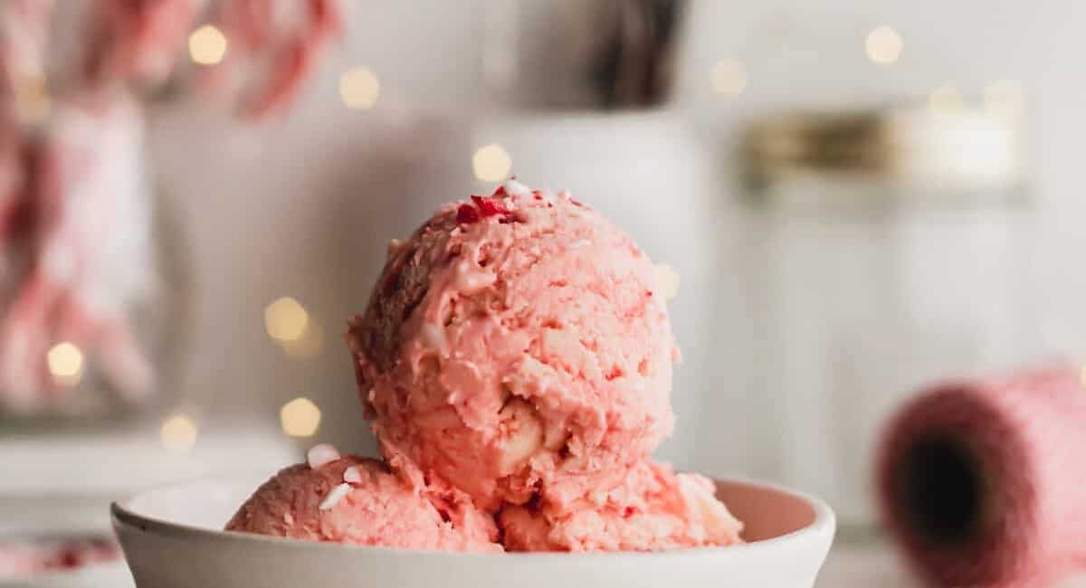 Up close image of peppermint ice cream with garnish.