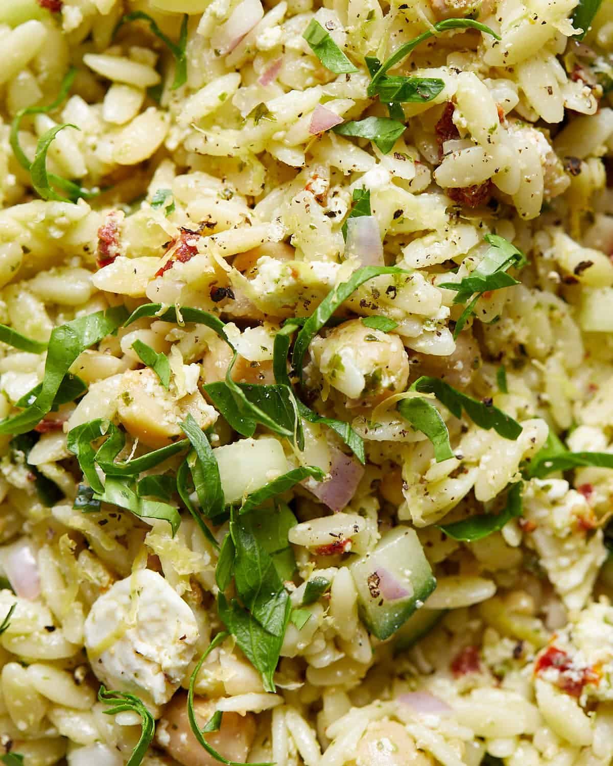Up close image of pesto orzo salad.