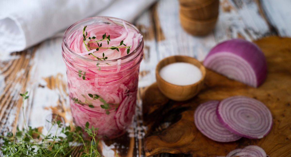 Overhead image of pickled onions.