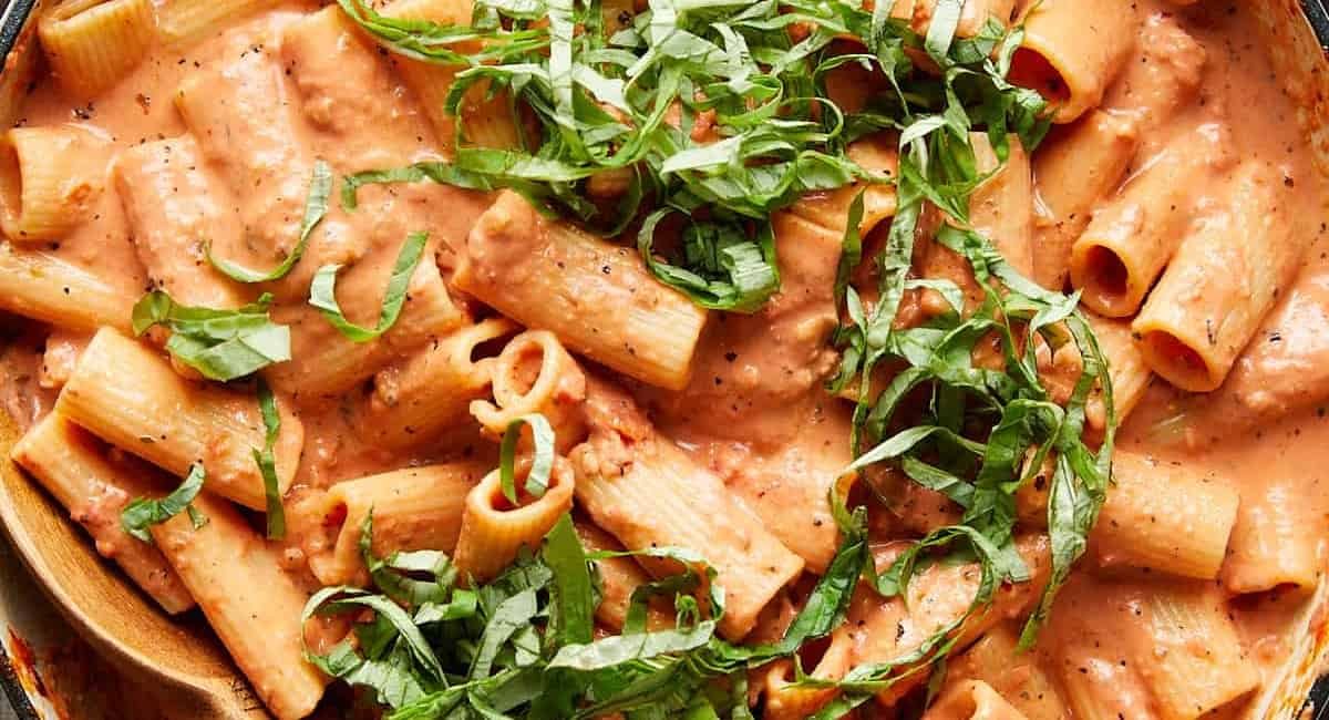 Overhead image of pink sauce pasta.
