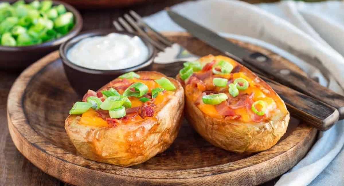 Overhead image of potato skins with garnish.