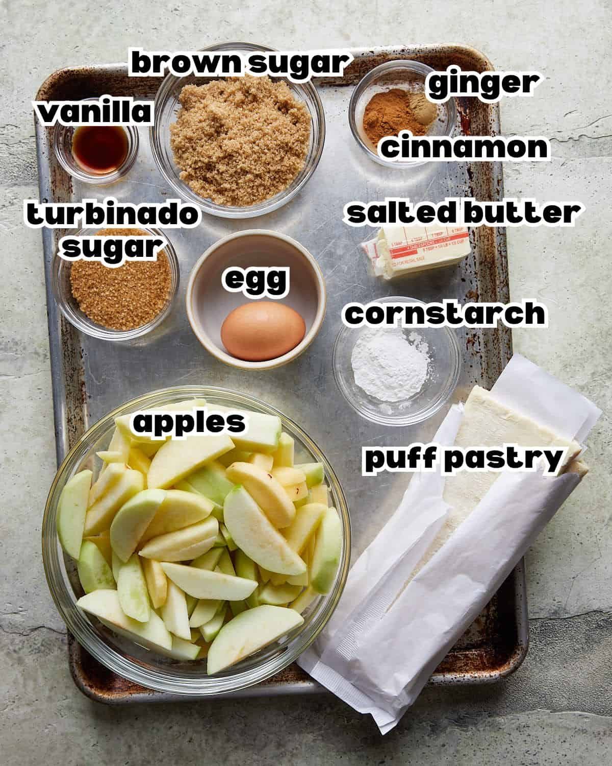 Overhead image of ingredients needed to make puff pastry apple pie.