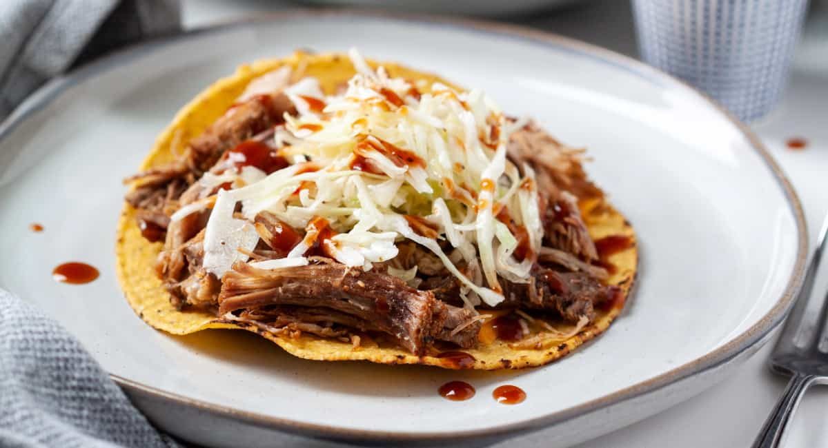 Up close image of pulled pork tostadas.