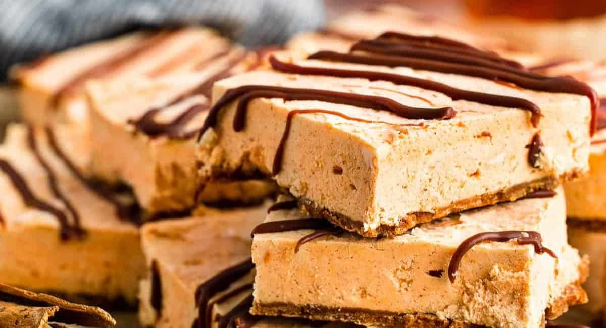 Up close image of no-bake pumpkin cheesecake bars.