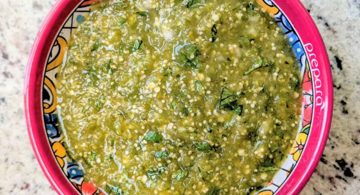 Overhead image of serrano salsa in small bowl.