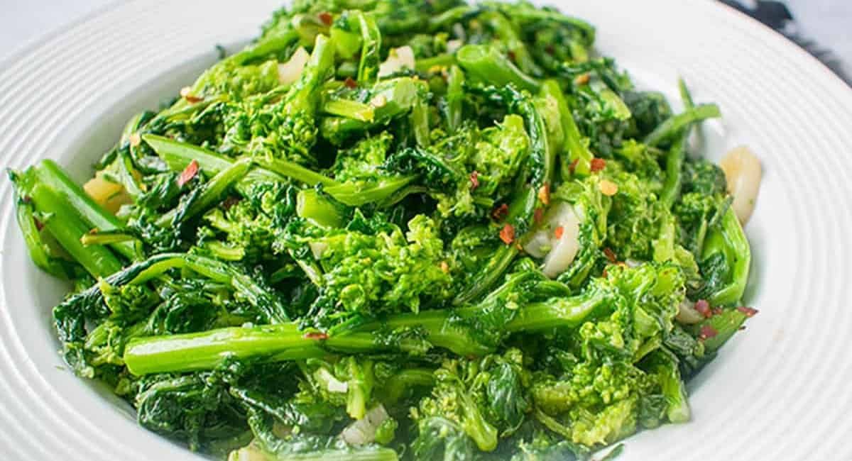 Overhead image of rapini with garlic.