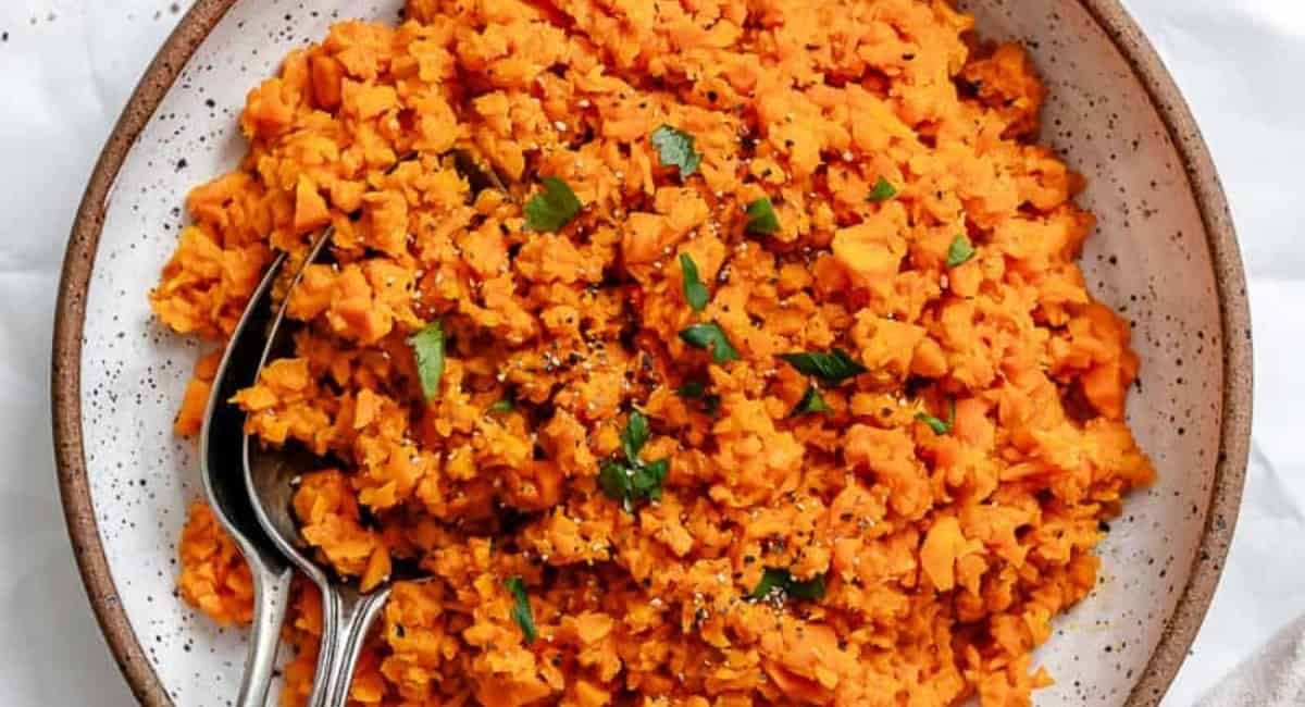 Overhead image of riced sweet potato with garnish.