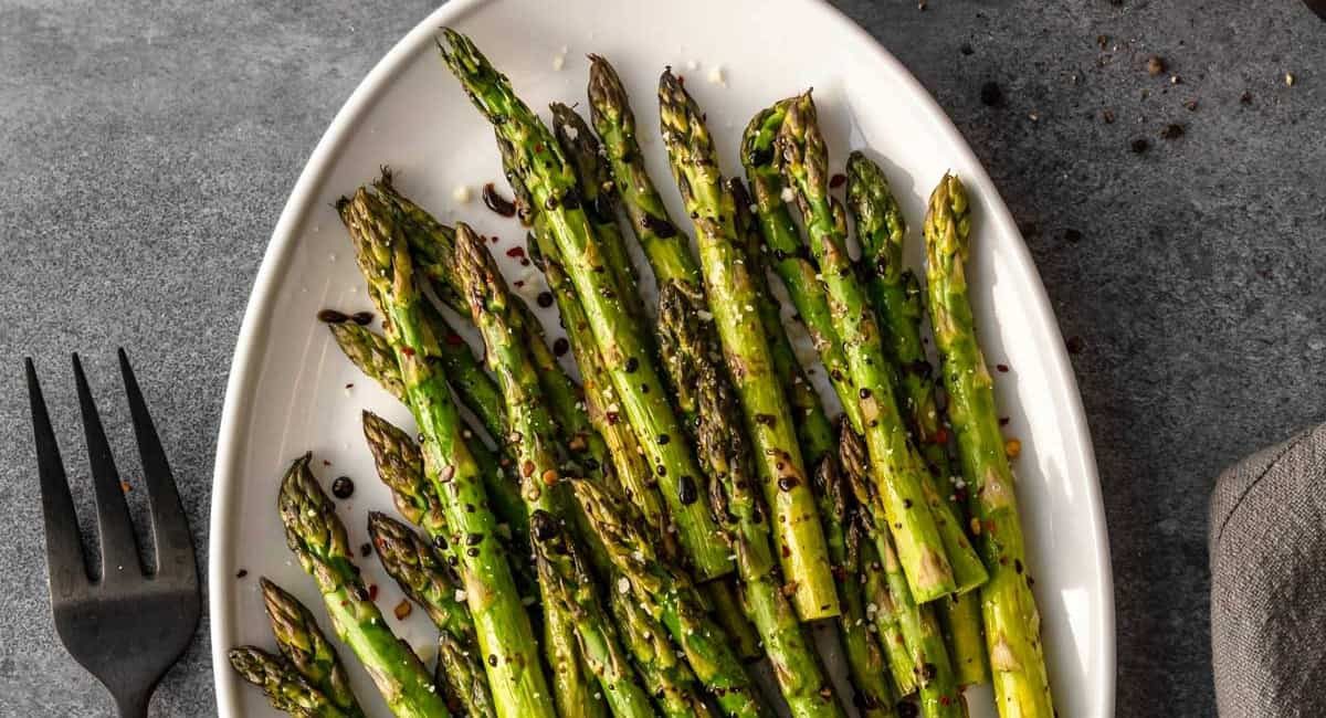 Overhead image of roasted asparagus with balsamic glaze.