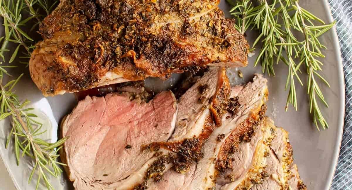 Overhead image of roasted boneless leg of lamb.