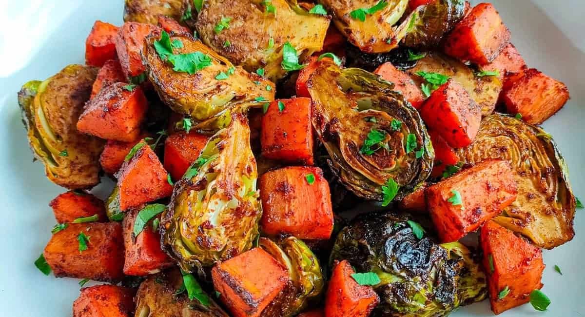 Overhead image of balsamic roasted brussels sprouts and carrots.