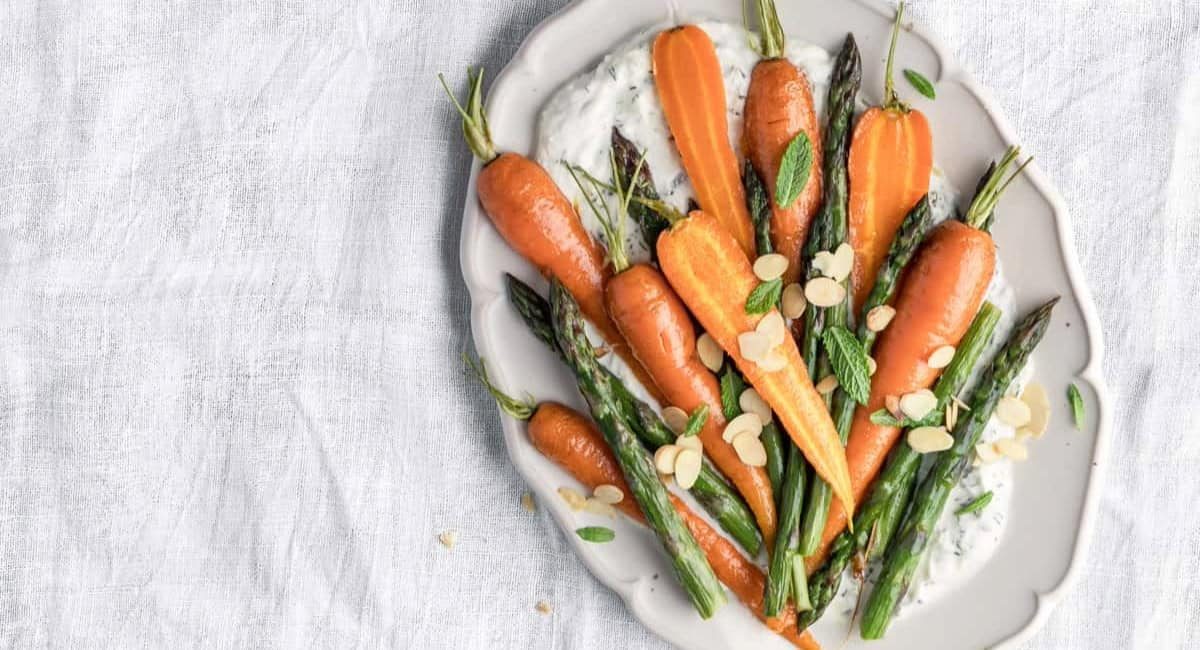 Overhead image of roasted carrots and asparagus.