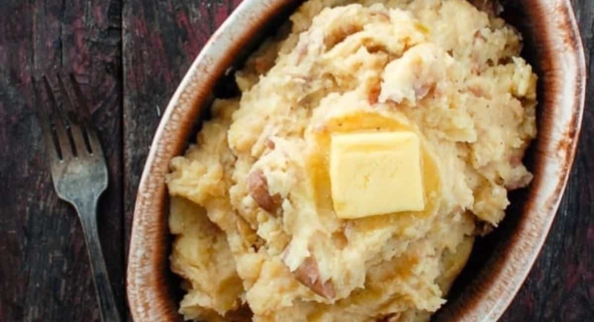 Overhead image of roasted garlic buttermilk smashed potatoes.