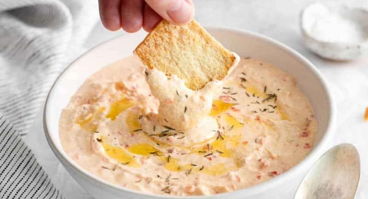Up close image of red pepper feta dip.