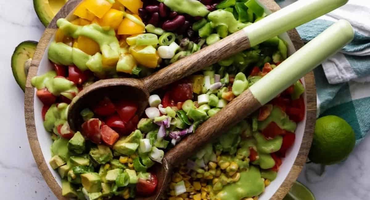 Overhead image of Mexican chopped salad with avocado dressing.