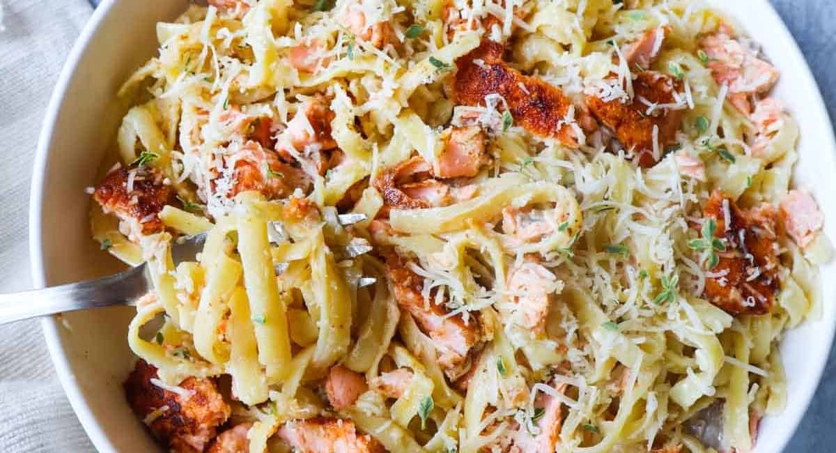 Overhead image of creamy cajun salmon alfredo.