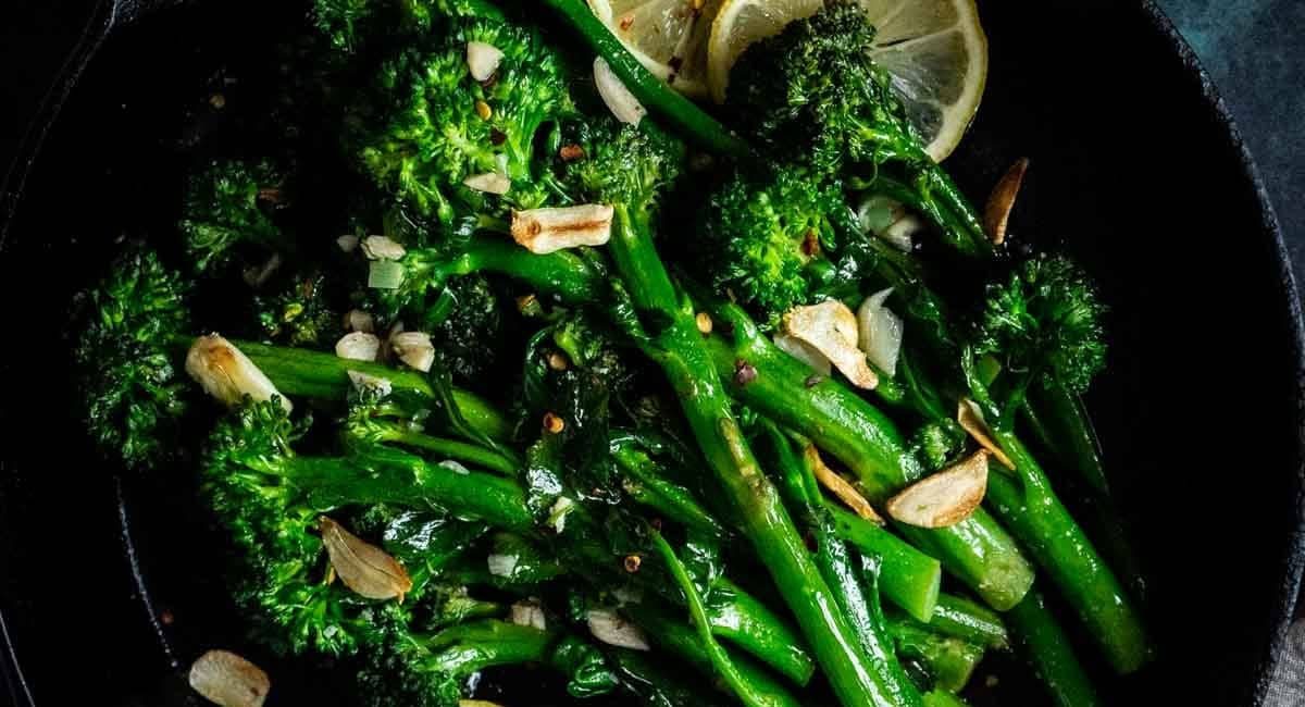 Overhead image of sautéed broccolini with garlic.
