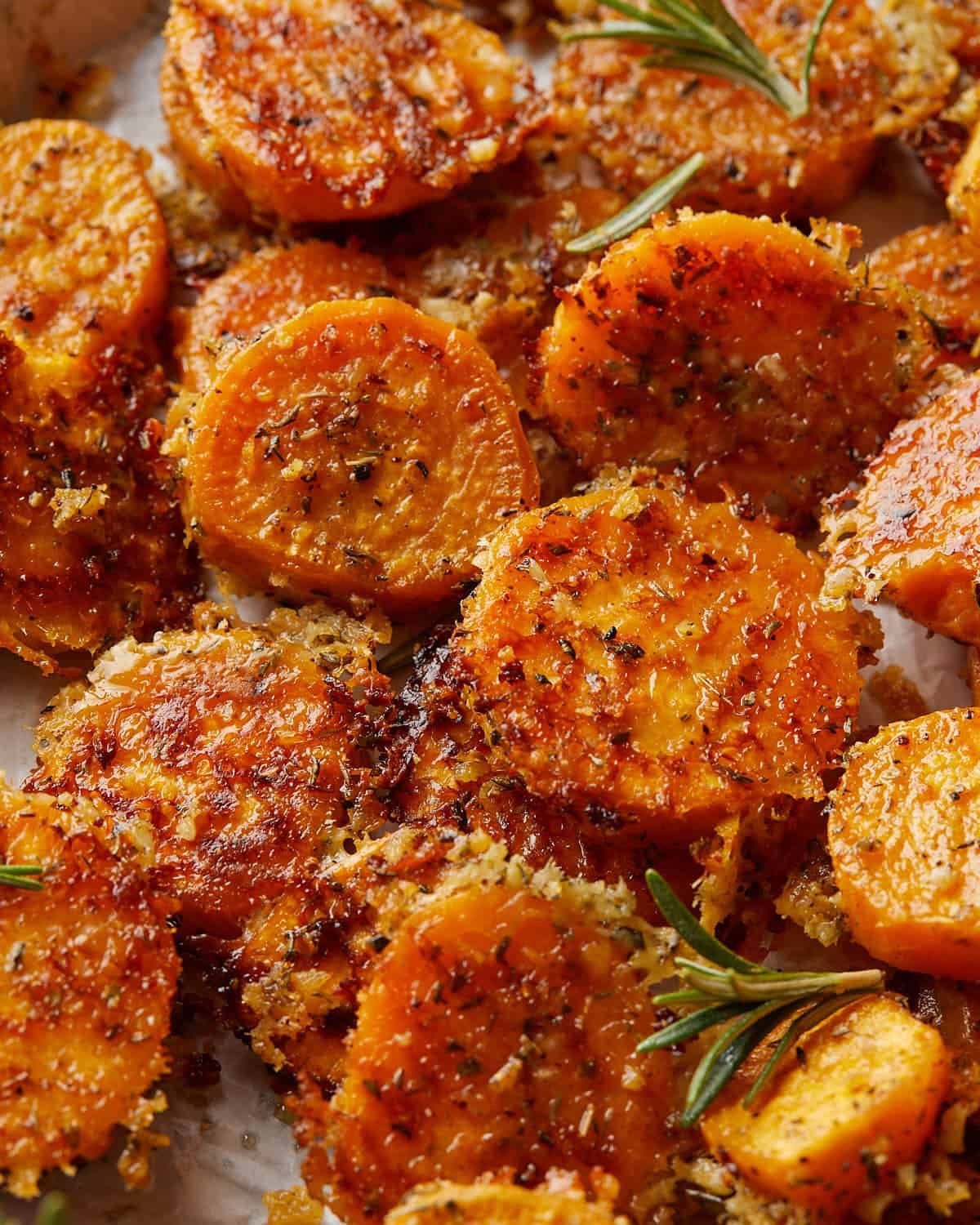 Up close overhead image of savory sweet potatoes with garnish.