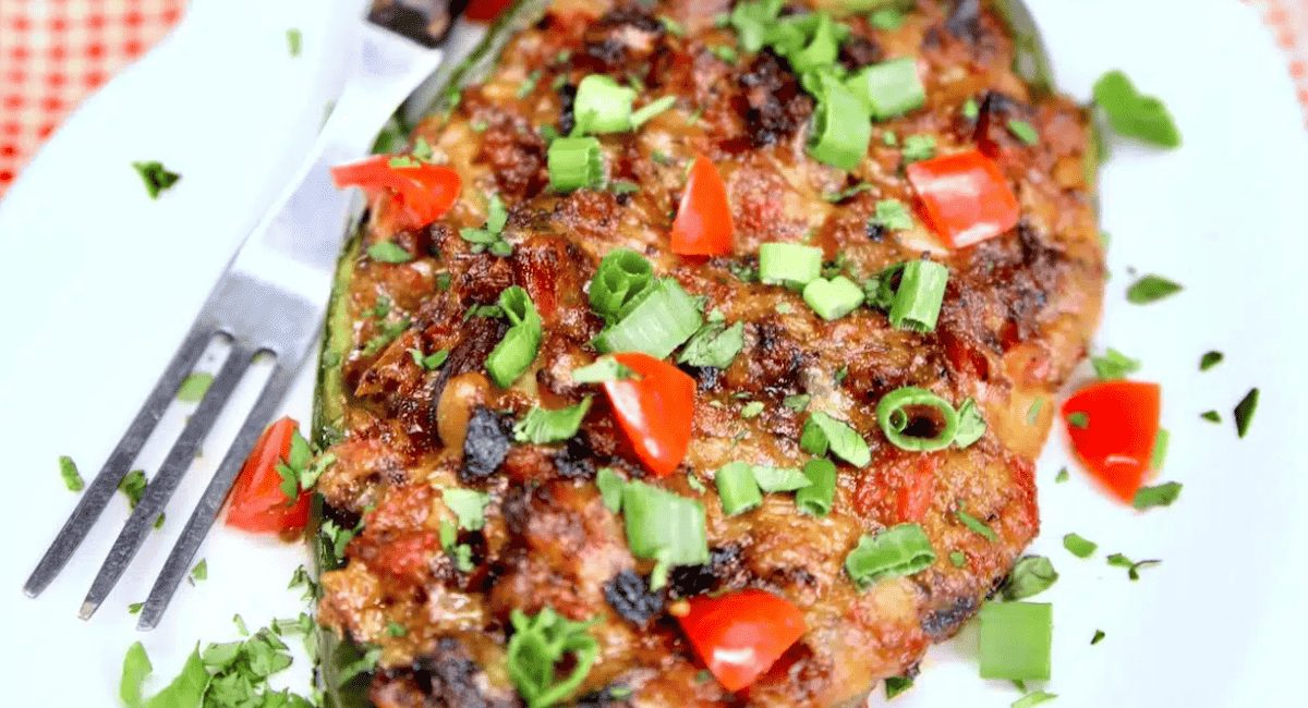 Overhead image of brisket stuffed poblano peppers.